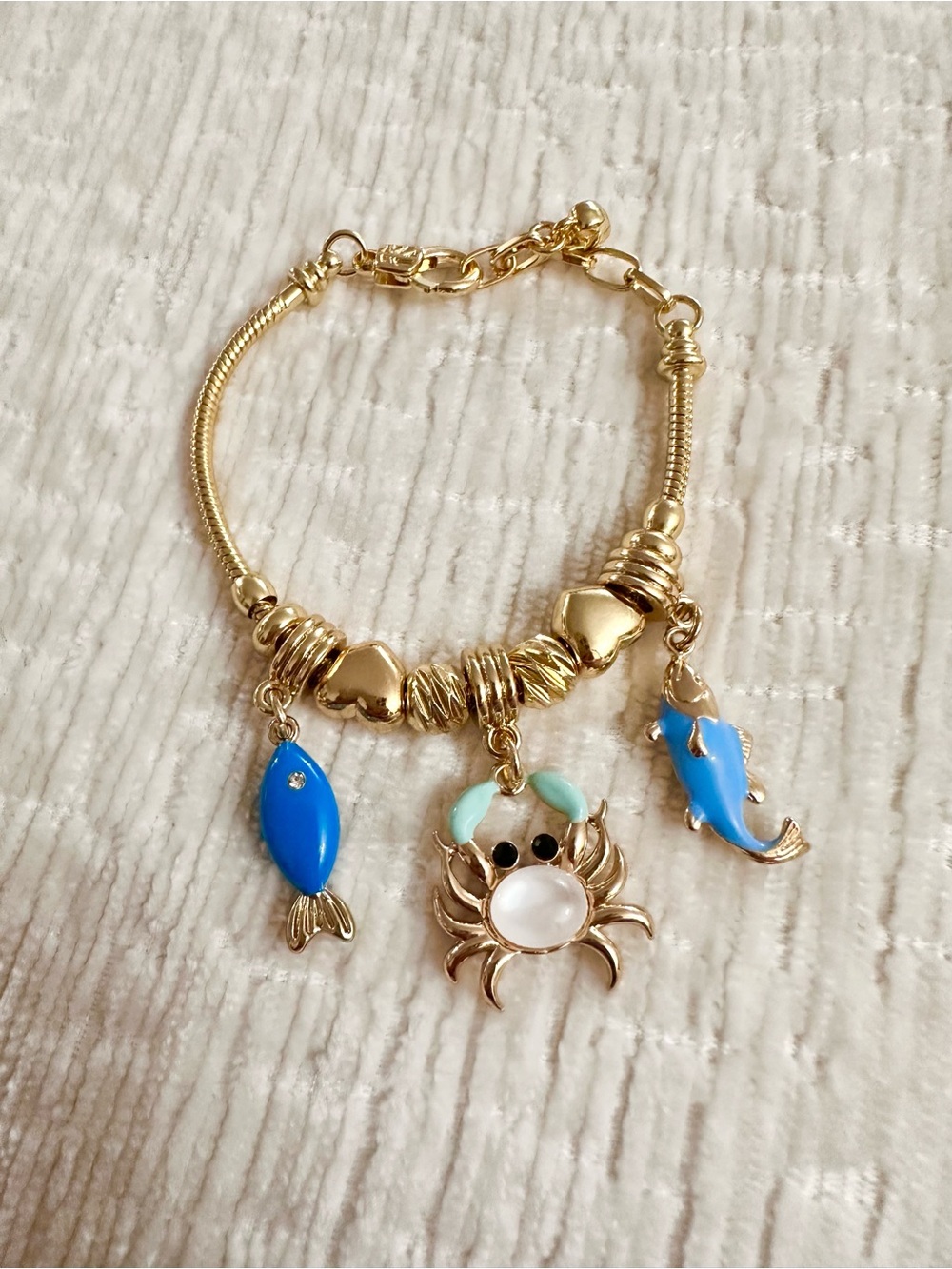 Gold Charm Bracelet with Blue Fish and Crab Charms